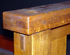 Detail front leg mortised-through the arm in a pyramid shaped tenon and pinned through-tenon at front of leg. 